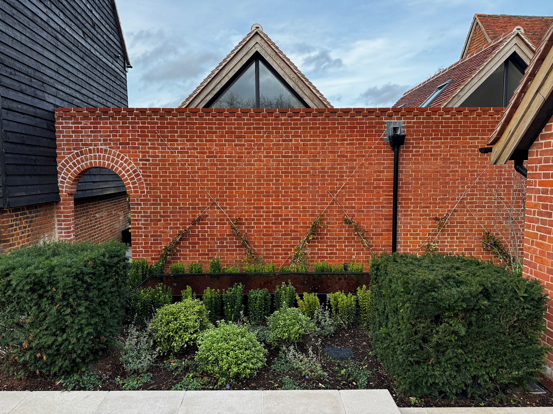 Red brick courtyard water feature image