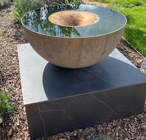 bronze mirror sound water feature